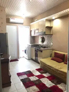 Apartemen the green pramuka city 2 kamar furnish