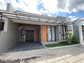 RUMAH MODERN KEKINIAN 800JT-an DALAM CLUSTER DI MLATI SLEMAN