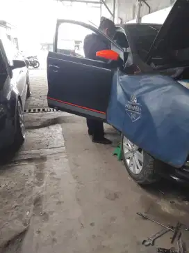 Di Butuh kan Mekanik mobil, Segera!!!