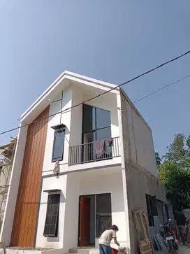 Rumah murah 2 lantai di pusat kota harga termurah