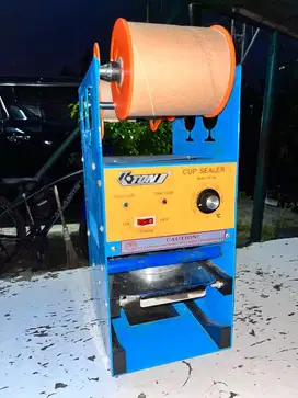 Mesin press cup sealer