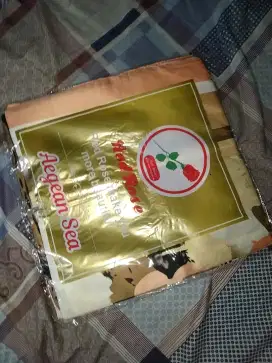 Jilbab segiempat bermotif