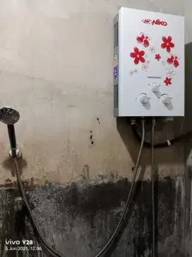 (Pemanas Air Kamar Mandi Merk Niko)
