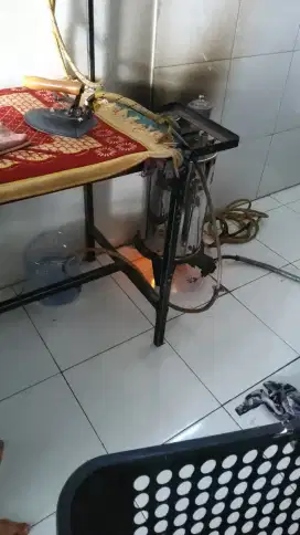 Karyawan Laundry untuk  Bagian Setrika Uap