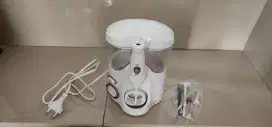 Water Flosser atau Oral Irrigator