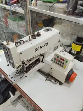 Mesin benho pasang kancing