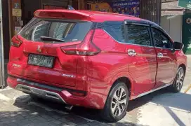 Xpander Sport Automatic merah, interior hitam. Km rendah, harga nego.