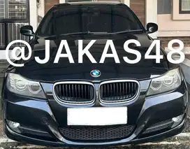 BMW 320i 2009 Bensin
