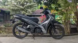 Supra x 125 helm in tahun 2011