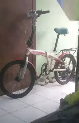 Sepeda lipat ukuran ban 20