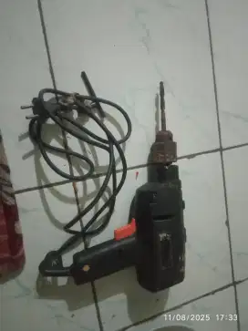 Mesin bor dan kunci shock