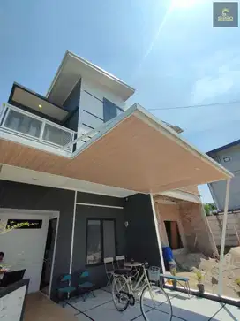 Rumah 2 lantai plus Mezzanine di Jalan Raya Ciater BSD Serpong