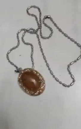 kalung titanium dan liontin batu ibrahim