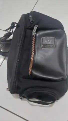 Tas tumi sling bag