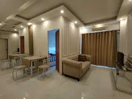 Disewakan furnish bagus apartemen puncak dharmahusada 2BR luas 56m²
