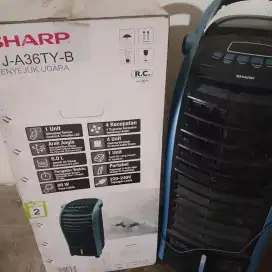 AC duduk merk Sharp