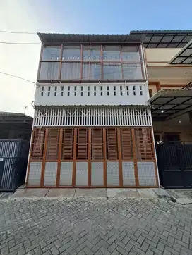 Rumah bangunan 4LT dan kondisi siap huni, selatan,di Perum Grand Poris