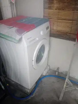 Mesin cuci front loading merk sharp