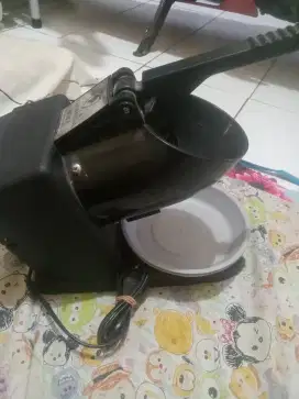 Penghalus es batu