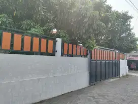 Rumah paviliun belakang SD model