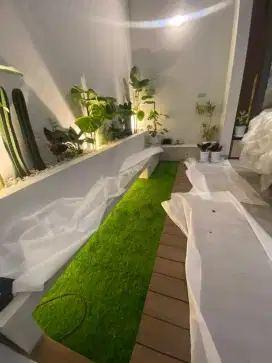 PUSATNYA RUMPUT SINTETIS