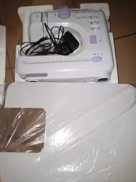 Mesin Jahit Portable