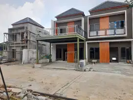 Hunia  exclusive 2lantai unit ready stok siap huni dekat pintu Toll