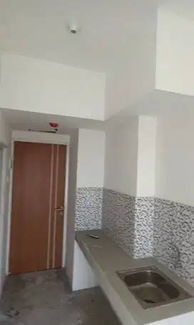 DIJUAL APARTEMEN PUNCAK CBD TOWER A LANTAI 55 - KOSONGAN - BARU GRESS