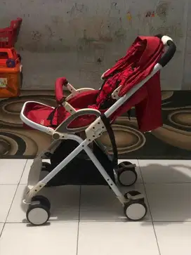 Stroler pliko warna merah