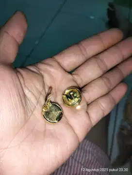 Gold aksesoris Nina Ricci
