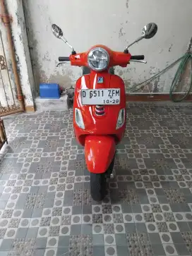 vespa lx125 merah