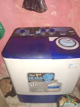 dijual cepat mesin cuci merk Aqua hijab 8 kg