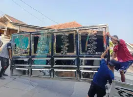 Pagar stenlis model dorong