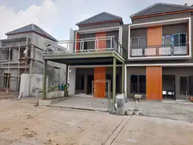 Rumah cluster pinggir jalan raya Unit SIAP HUNI , SHM sudah pecah