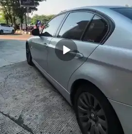 BMW 320i 2009 Bensin