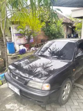 Baleno 1997 warna hitam, milik pribadi .