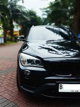 BMW X1 sDRIVE 18i BLACK ON BLACK KM 77RB PAJAK ON MULUS