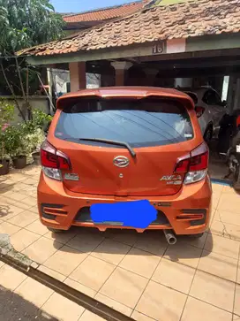 Jual Ayla R . 1.2 AT Bensin Orange Metalik