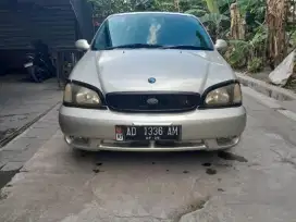 Kia Carnival AT 2002 tinggal pake tipe tertinggi