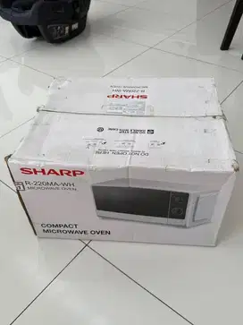 Microwave oven sharp R-220MA-WH
