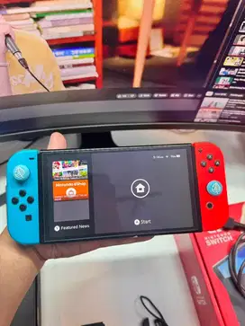 Nintendo Switch OLED 256 Gb + case + sarung