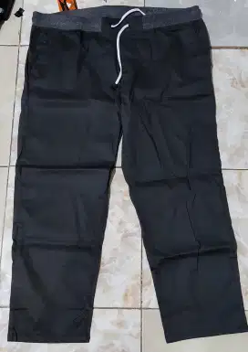 Celana chino jumbo Abu-abu