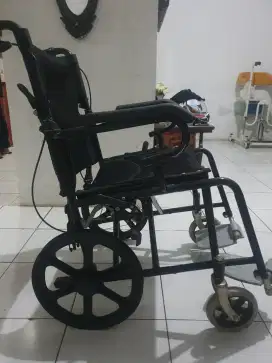 Kursi roda traveler