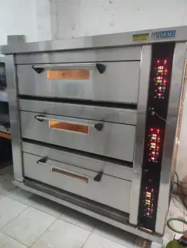 Oven gas 3 deck isi 9 tray merk Sinmag Taiwan steam stone deck atas