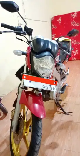 Vixion 2009 warna merah maroon