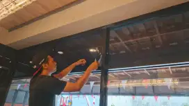 Spesialis kaca film cafe peredam panas silau cafe resto apartmen hotel