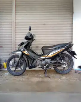 Honda Supra X 125 FI CW Golden Matte Black