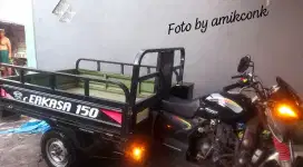 Motor roda tiga