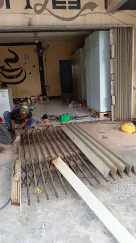 Service Rollingdoor Foldinggate pintu garasi panggilan murah