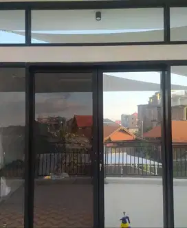 Pasang kaca film perkantoran studio kacafilm perumahan stiker neon box